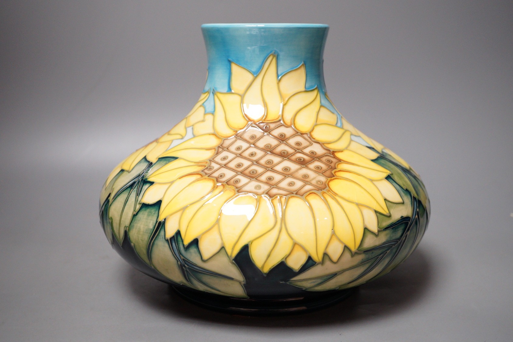 A Moorcroft pottery vase of compressed form, decorated in the 